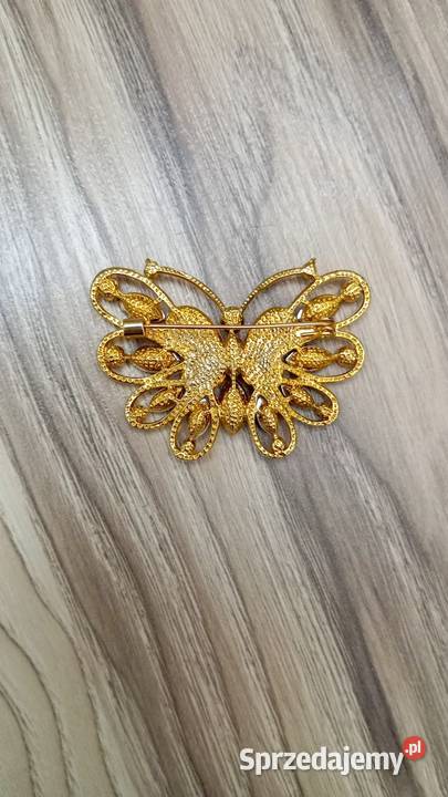 Złota broszka motyl