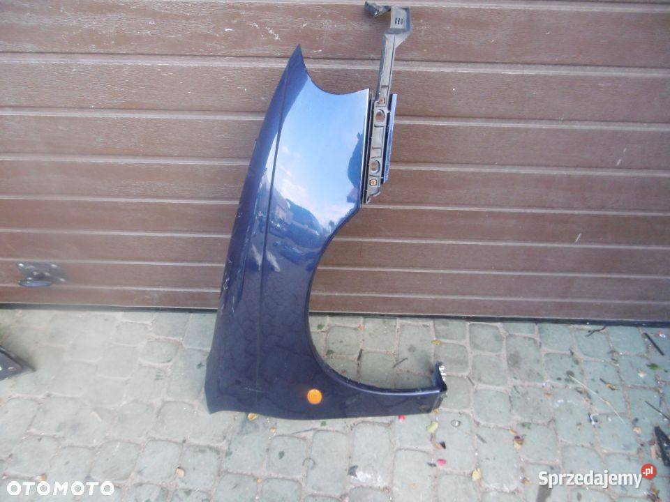 Błotnik pawy OPEL TIGRA Błotniki