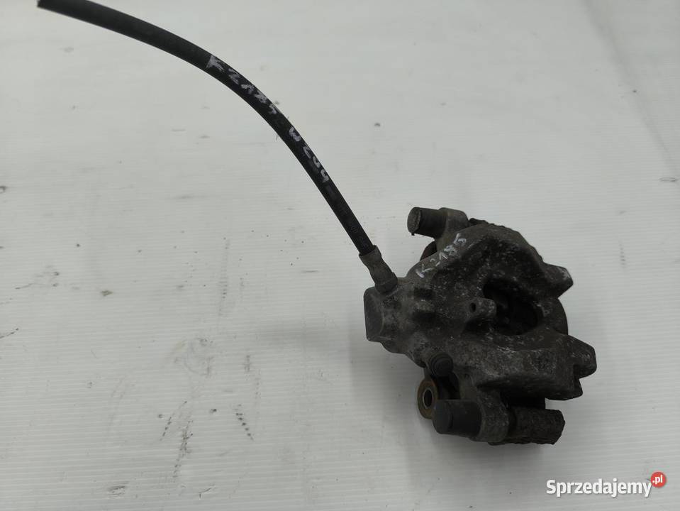 ZACISK LEWY TYŁ MERCEDES C W204 LIFT 18