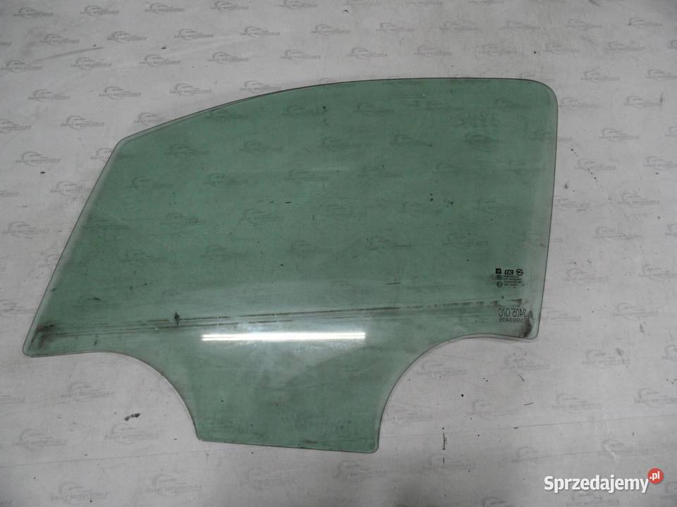 OPEL MOKKA A 13r szyba drzwi lewy przód 25993405 Drzwi