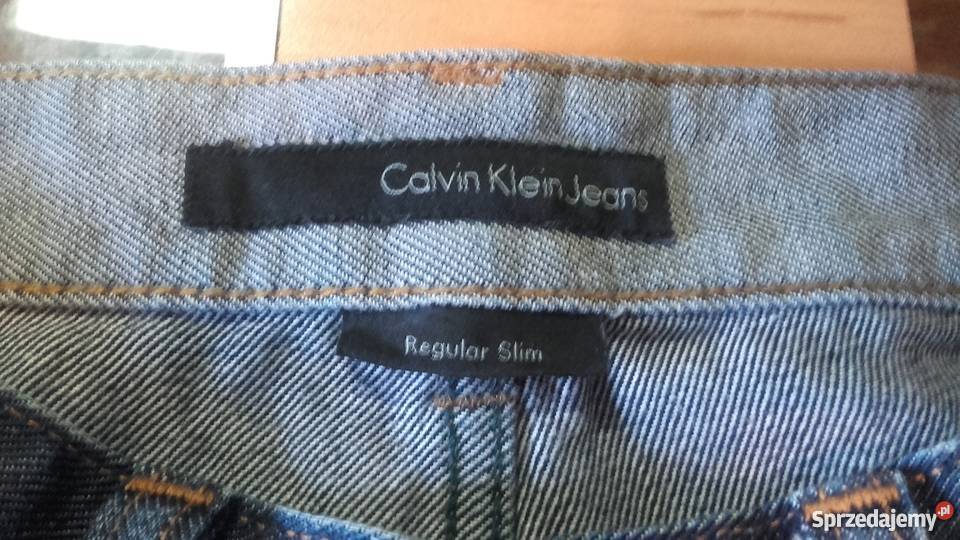 dzinsy Calvin Klein regular slim z dziurami