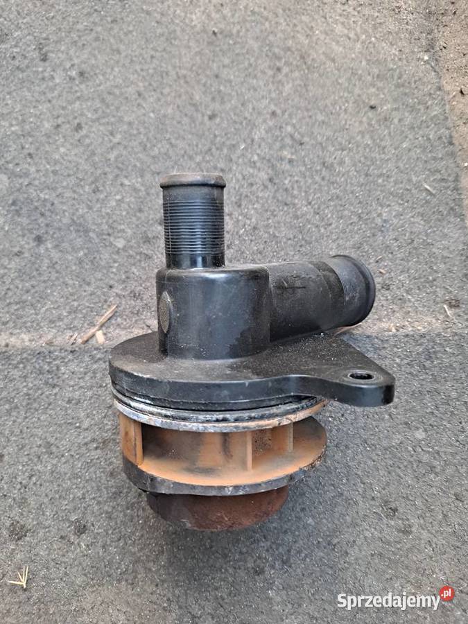 Króciec pompy wody 14 KFX saxo peugeot citroen Rząska