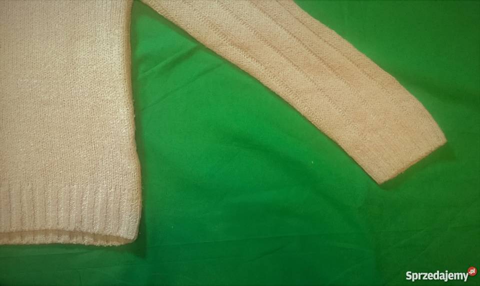 Kremowy sweter Opinion By Spengler z golfem sprzedam