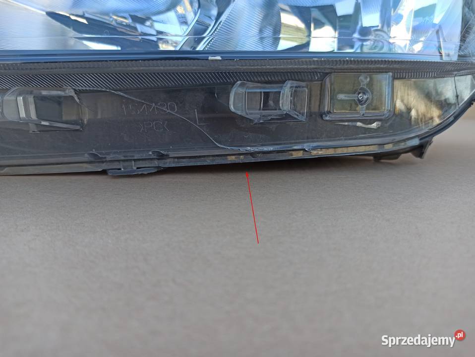 FORD TRANSIT COURIER REFLEKTOR LEWY LAMPA LEWA Oświetlenie Trzciel