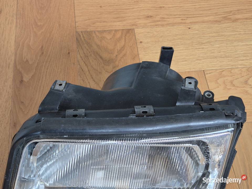 Reflektory H4 Audi 100 C4 Lewy i Prawy silniczki Lampy przednie dolnośląskie sprzedam