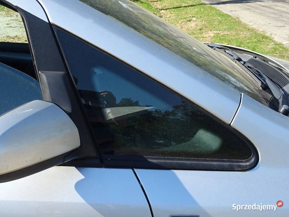 Trujkąt szyba boczna bok Zafira B osobowe Parcice