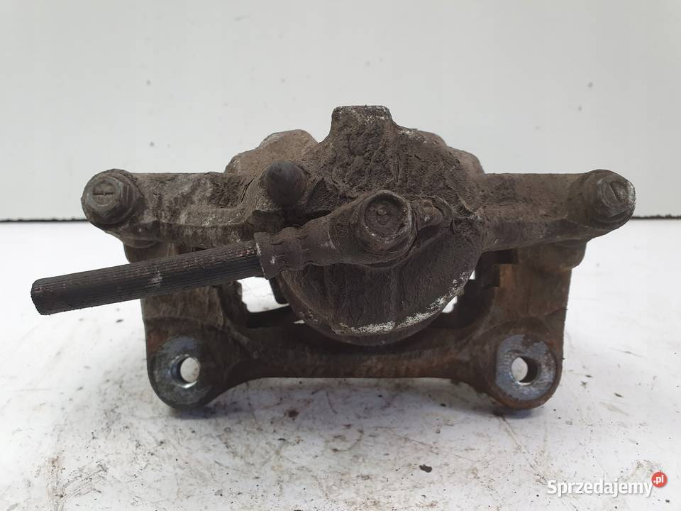 Toyota Corolla XII E21 LEWY PRZEDNI ZACISK Części samochodowe Rudka