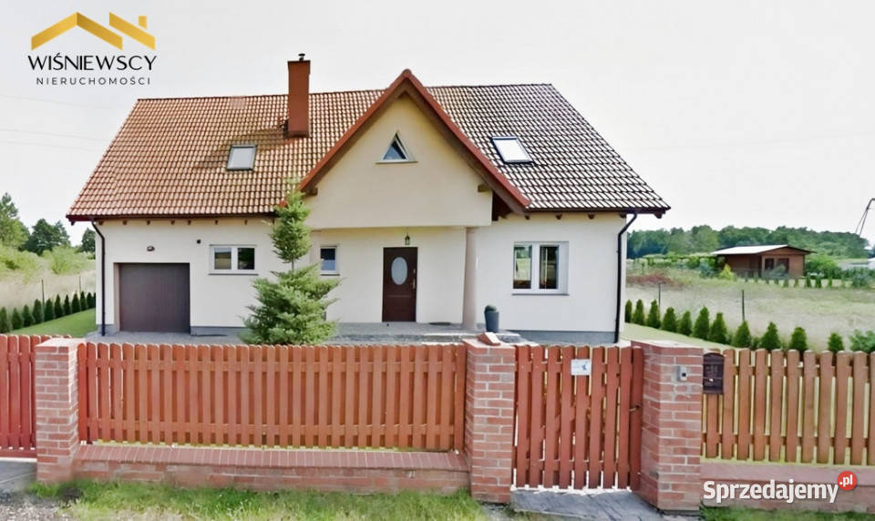 Rodzinny dom z tarasami i ogrodem w Rogitach