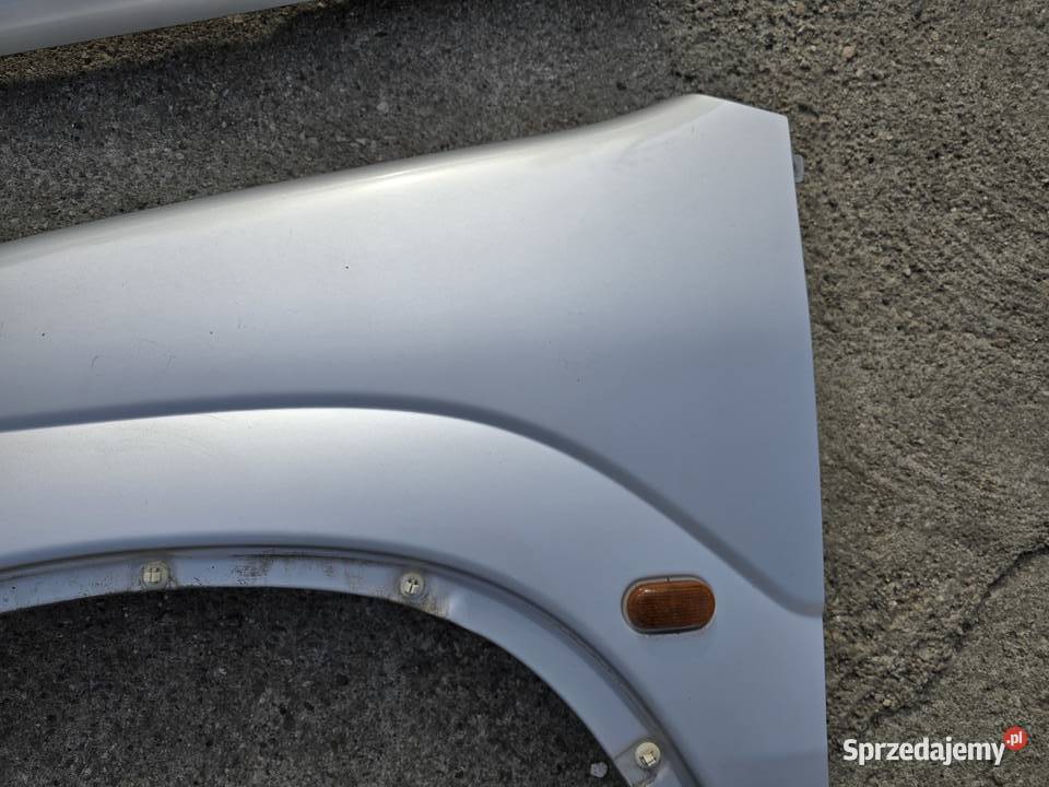 Suzuki Ignis FH 0003 błotnik błotniki przednie Legnica