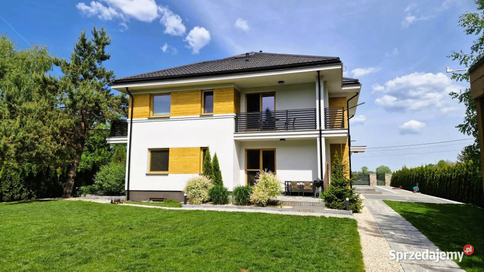 Modernistyczny dom jeziorem z funkcją pensjonatu