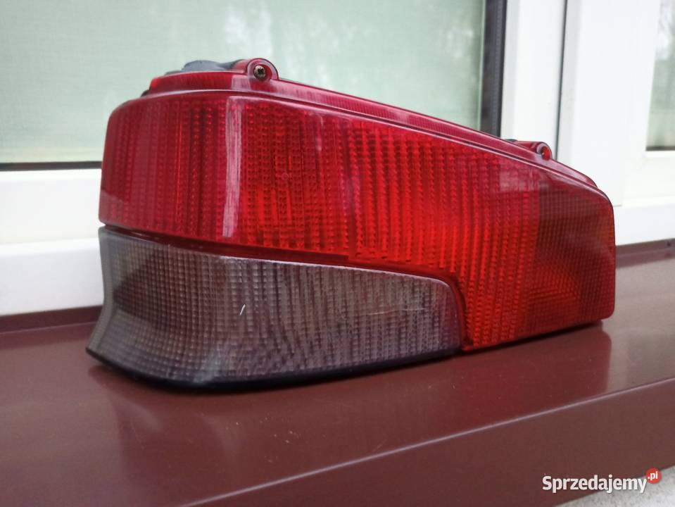 Peugeot 106 lampa tył tylna lewa wkład oprawka Oświetlenie Sieradz