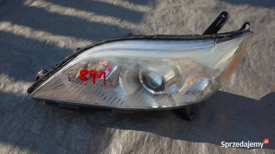 TOYOTA SIENNA 2011 REFLEKTOR LAMPA PRZÓD LEWA Ruda Śląska