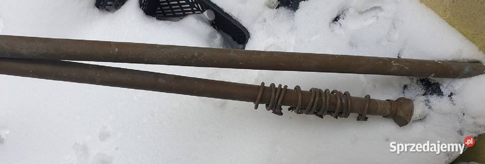 Zabytkowy mosiężny karnisz z żabkami Reszel