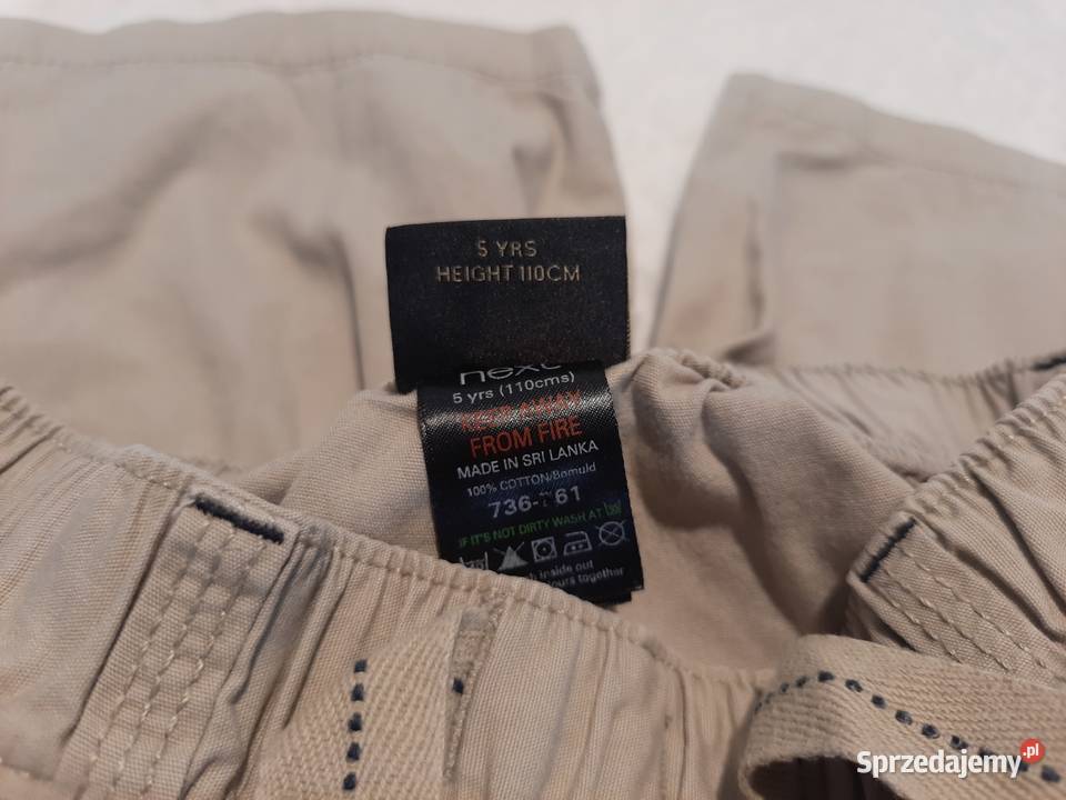 Krótkie spodenki chłopięce khaki Next 110 Odzież Rozmiar 110 śląskie