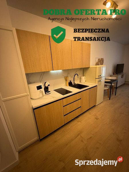 Kawalerka z ogródkiem Motławą