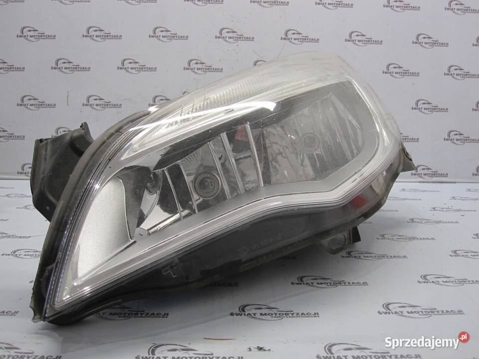 OPEL ASTRA J 10r lampa lewa przód 13253656 Lampy przednie