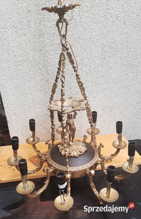 Żyrandol mosiężny 9 ramienny z figurką chłopca Poznań