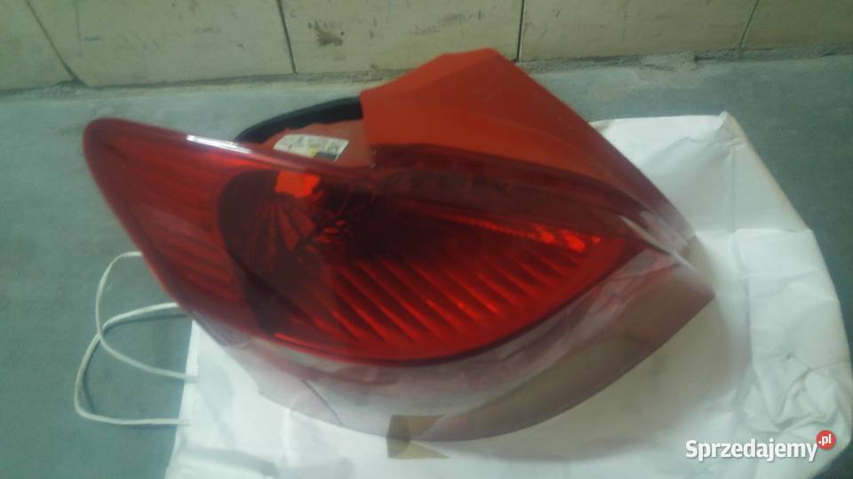Oryginalna lampa Toyota Yaris II LUNA 2008 tył Warszawa sprzedam
