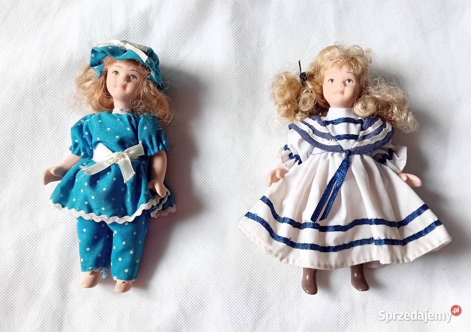 Dwie porcelanowe lalki w strojach wiktoriańskich Porcelana i szkło