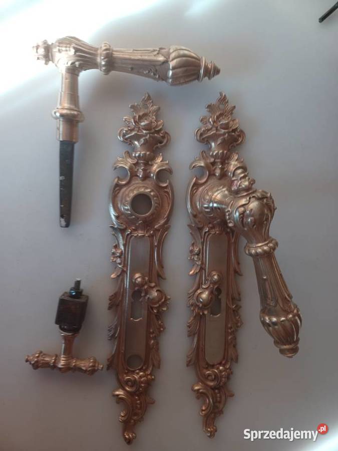 Mosiężne klamki i szyldy pałacowe Drzwi Poznań