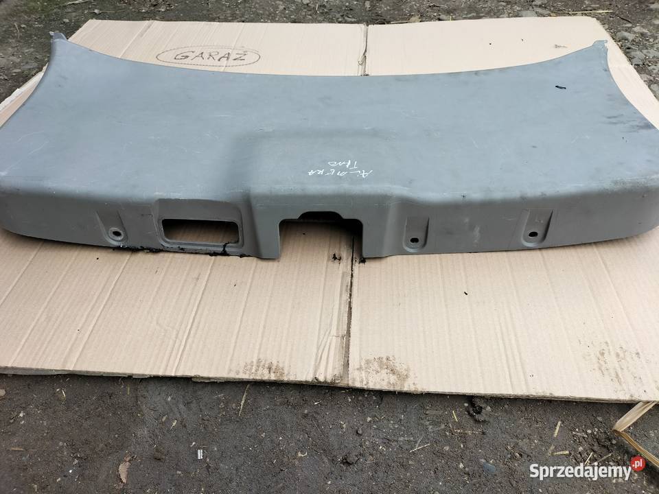 NISSAN ALMERA TINO 90900BU000 OSŁONA TAPICERKA Osłony i zaślepki