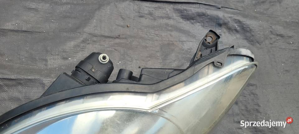 PEUGEOT 107 LEWY REFLEKTOR LAMPA LEWA PRZOD 1490 Ruda Śląska