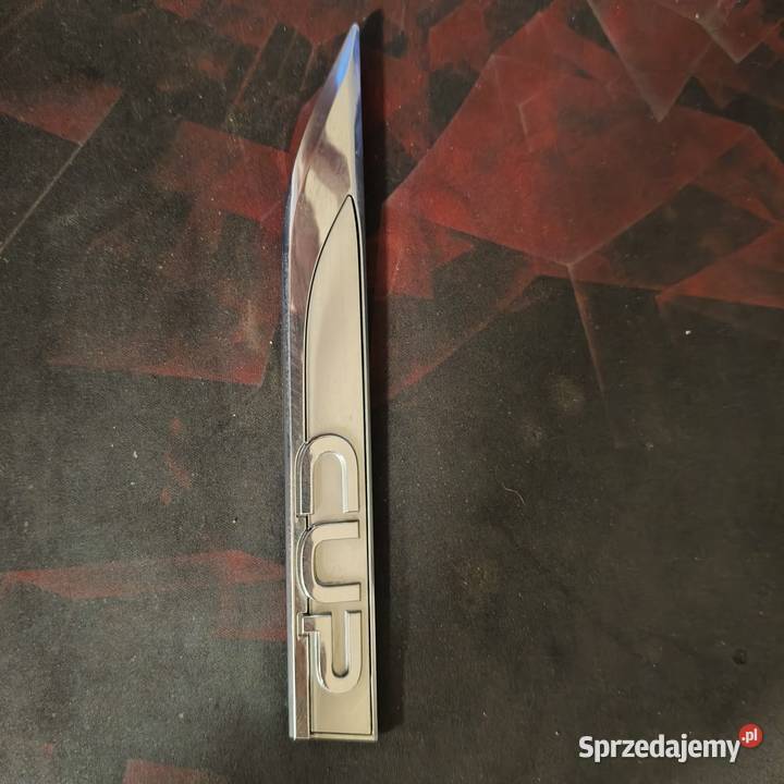 VW golf 7 emblemat CUP lewy przód błotnik Luzino