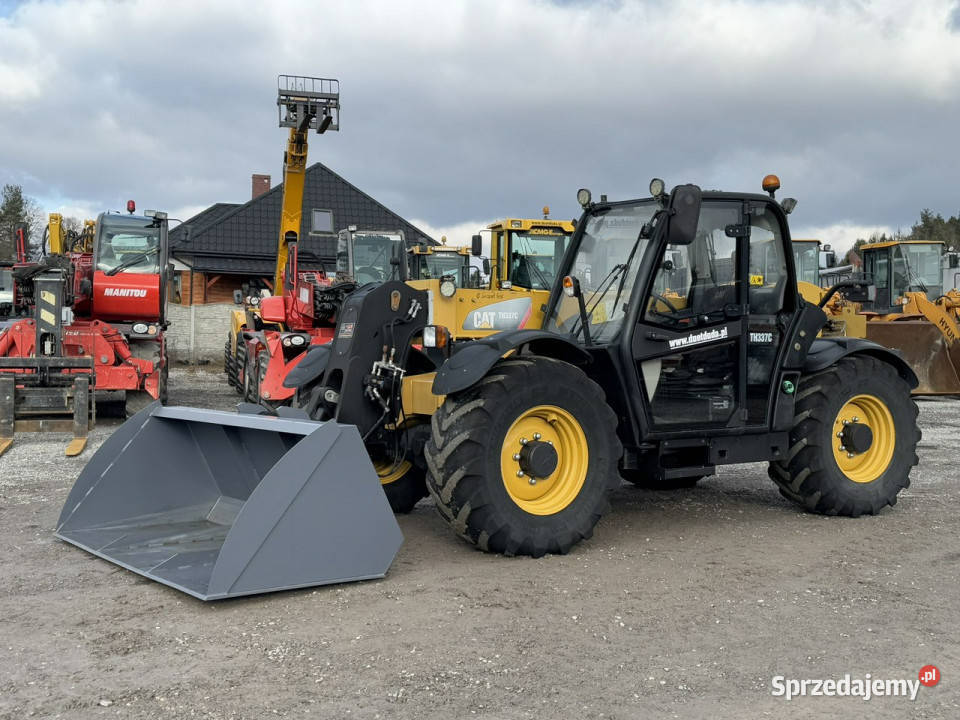 średnia kołowa Caterpillar TH337C Super Stan 7800h Widełki sprzedam