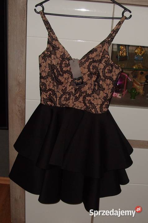 Rozkloszowana FORTI NOWA sukienka z koronką i wielkopolskie Rawicz