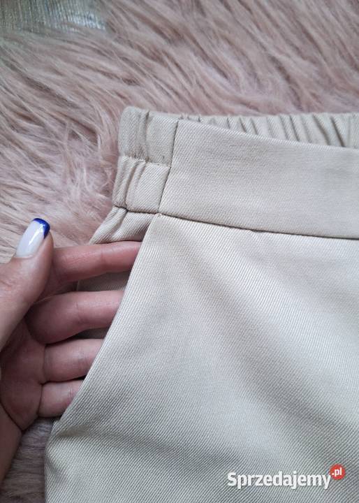 Spodnie materiałowe beżowe Reserved szerokie Kraków