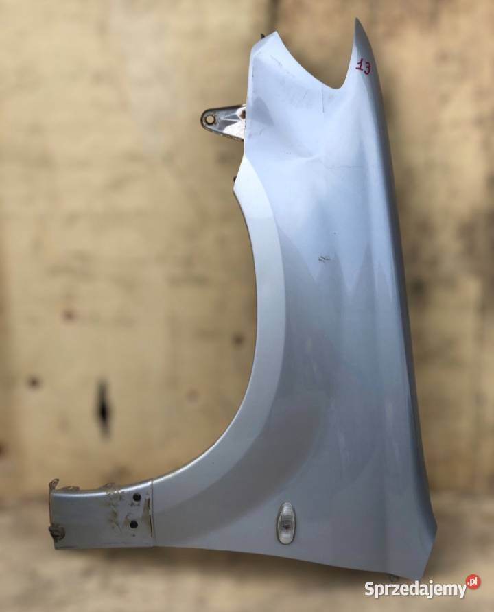 Błotnik lewy przód MITSUBISHI OUTLANDER I do osobowe Skołoszów