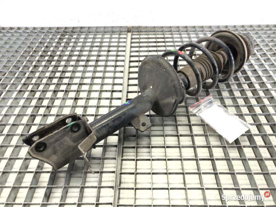 AMORTYZATOR LEWY PRZÓD ZE SPRĘŻYNĄ DACIA DUSTER