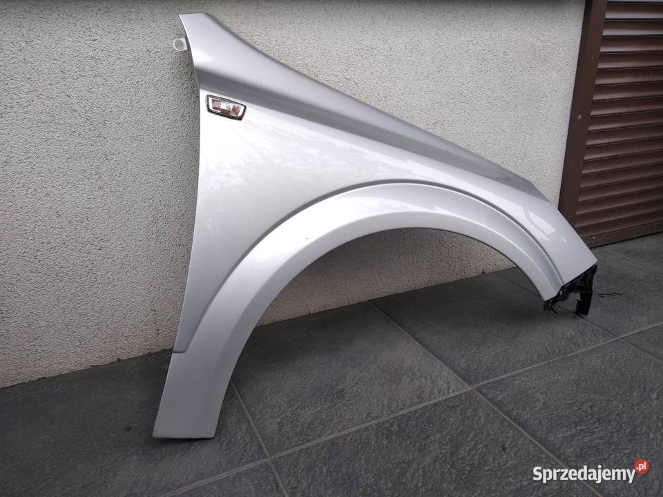 Opel Astra H błotnik przedni prawy srebrny Z157 Sieradz