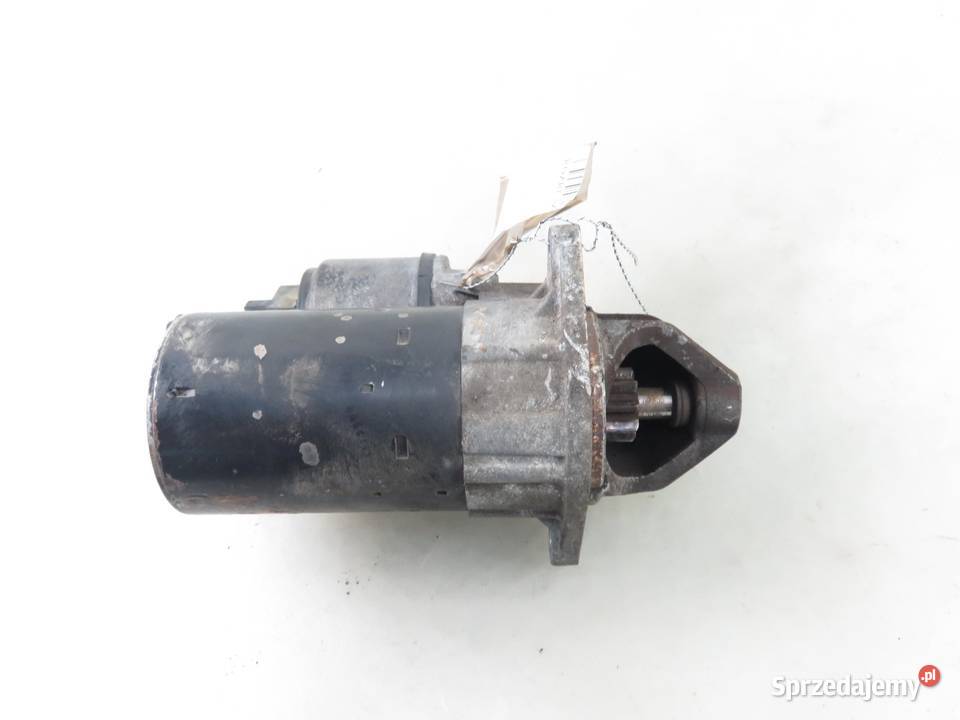 ROZRUSZNIK OPEL CORSA 12 24436877 0001107408 Układ elektryczny silnika Części samochodowe