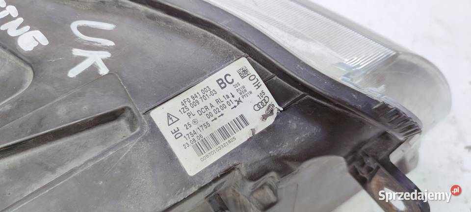 REFLEKTOR LEWY AUDI A6 C6 4F0941003BC SKRĘTNY UK Przystajń sprzedam