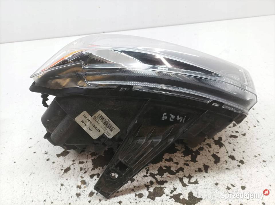 LAMPA PRZÓD LEWA EUROPA 68110997AE Jeep Grand Lampy przednie