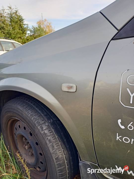 Błotnik lewy nissan primera P12 K30 G części blacharskie Szczecin