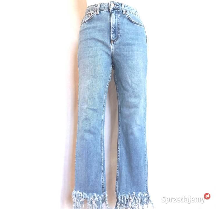 Spodnie jeans Frędzle niebieskie Pióra r 38