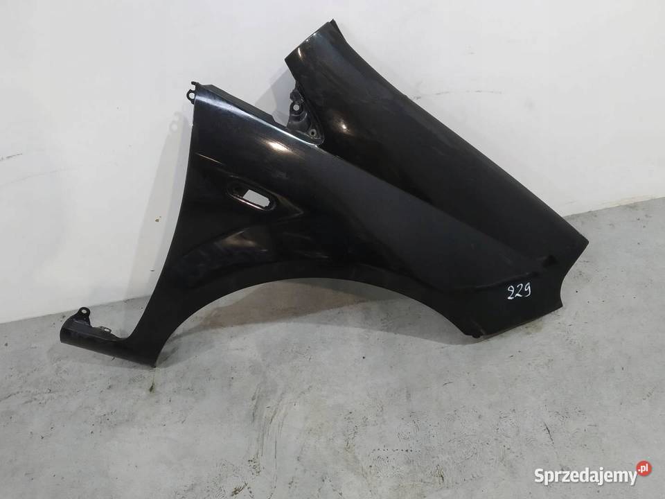 BŁOTNIK PRAWY PRZÓD 876 Fiat Grande Punto osobowe