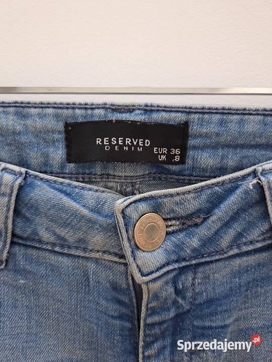 Jasnoniebieskie jeansy skinny Reserved rozmiar Spodnie Trąbki Wielkie