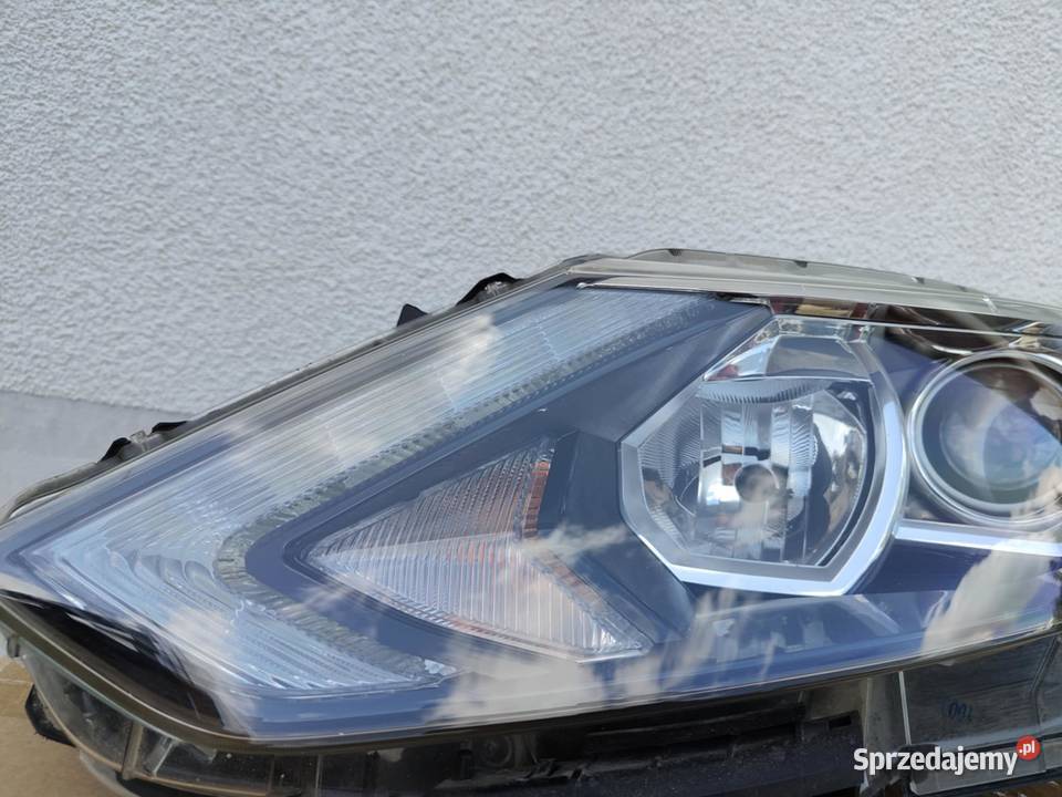 Lampa lewa Nissan Qashqai 2 J11 soczewka H11 osobowe Kielcza