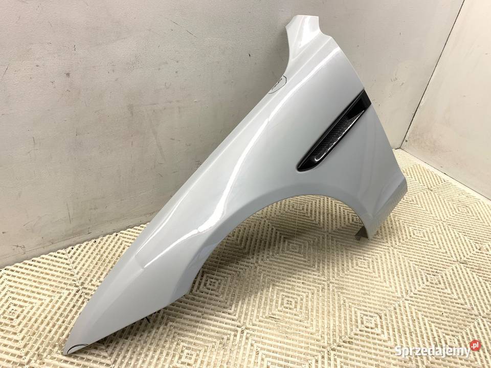 BŁOTNIK LEWY PRZÓD JAGUAR XF II Kombi GLACIER osobowe Błotniki