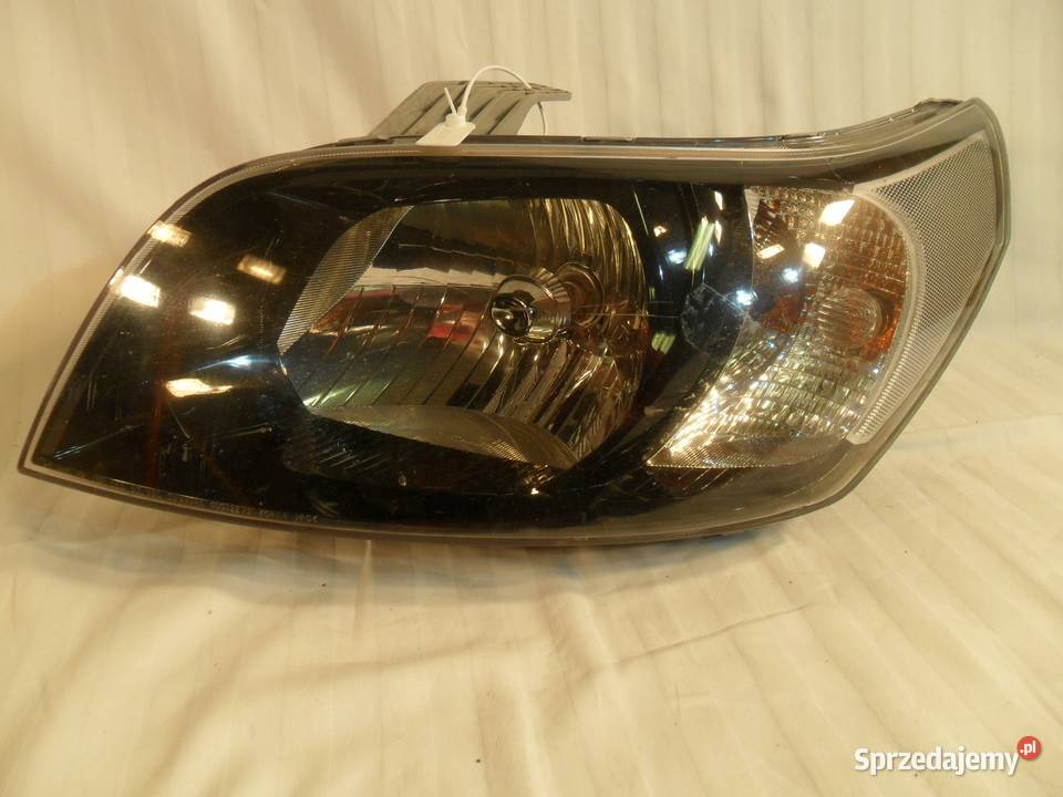 CHEVROLET AVEO KALOS 14 2008 reflektor lewy wielkopolskie sprzedam