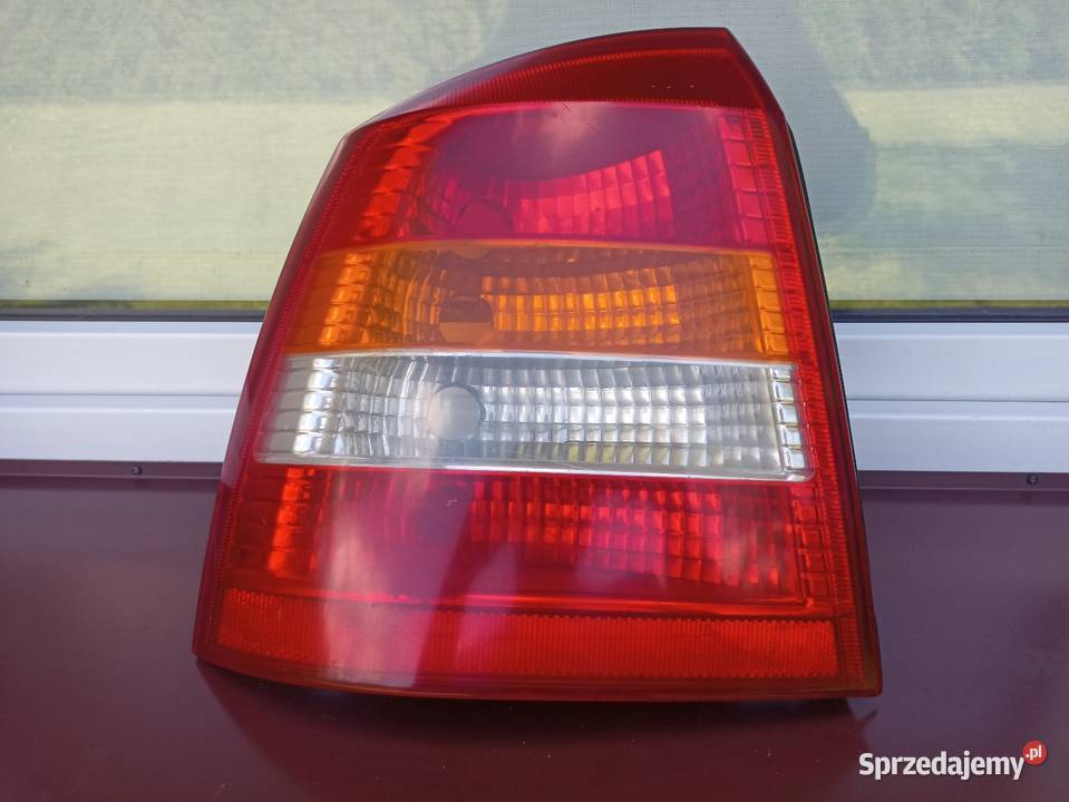 Opel Astra G II hatchback lampa tył tylna lewa Oświetlenie Sieradz