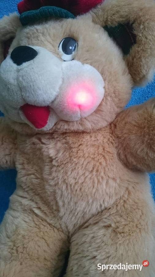 Misiek pluszowy świąteczny gra Jingle Balls i