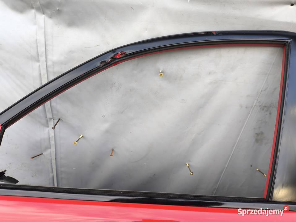 MITSUBISHI L200 IV DRZWI PRZEDNIE TYLNE LEWE osobowe