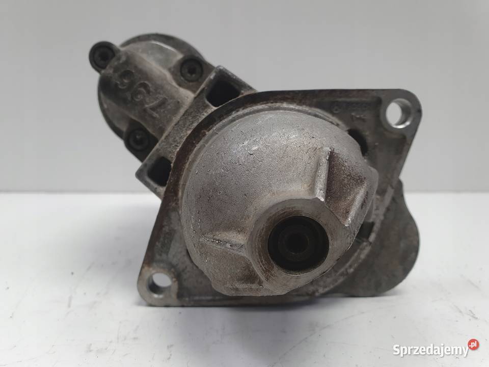 Opel Corsa D 14 16V ROZRUSZNIK bosch 0001107493 Układ elektryczny silnika Janów