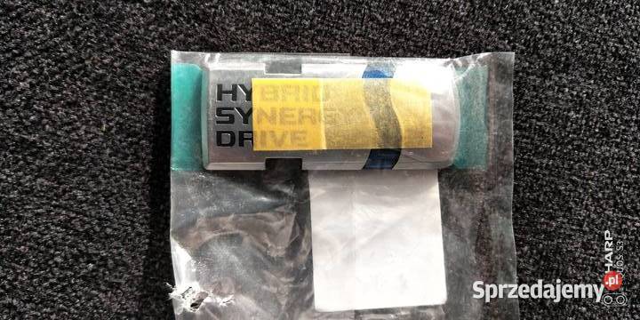 Logo Toyoty Hybridy Synergy Drive Łódź