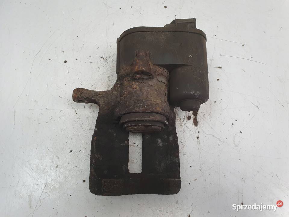 Volvo S60II XC60 TYLNY ZACISK HAMULCOWY LEWY tył lubelskie