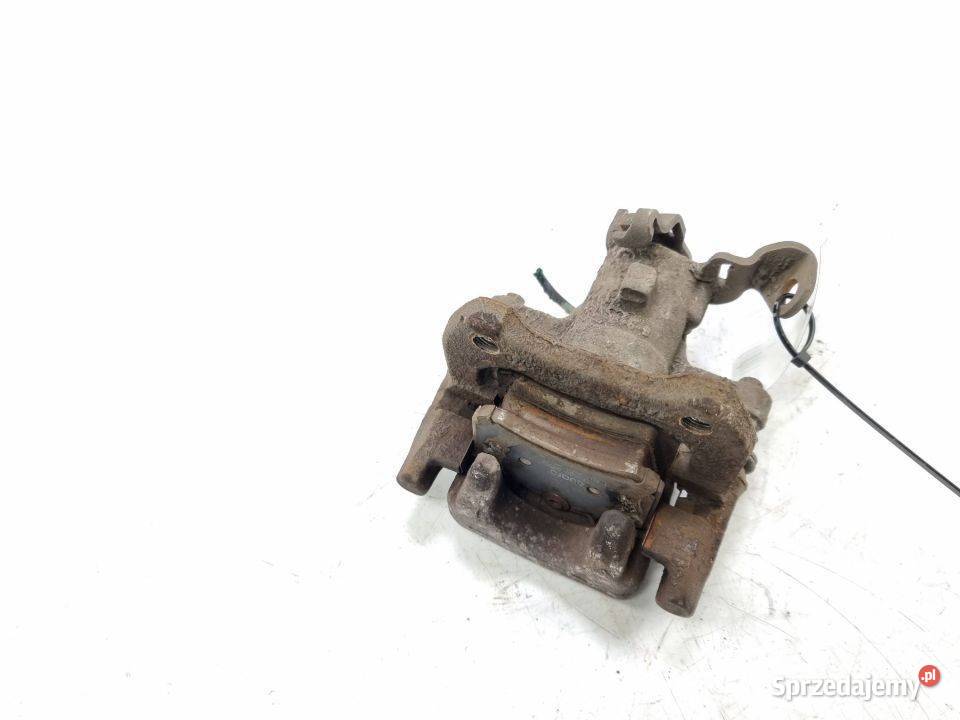 ZACISK HAMULCOWY TYŁ LEWY RENAULT CLIO III